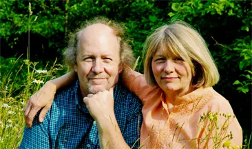Karl and Bev Black, founders of Olympic Mountain Ice Cream, in a summer meadow